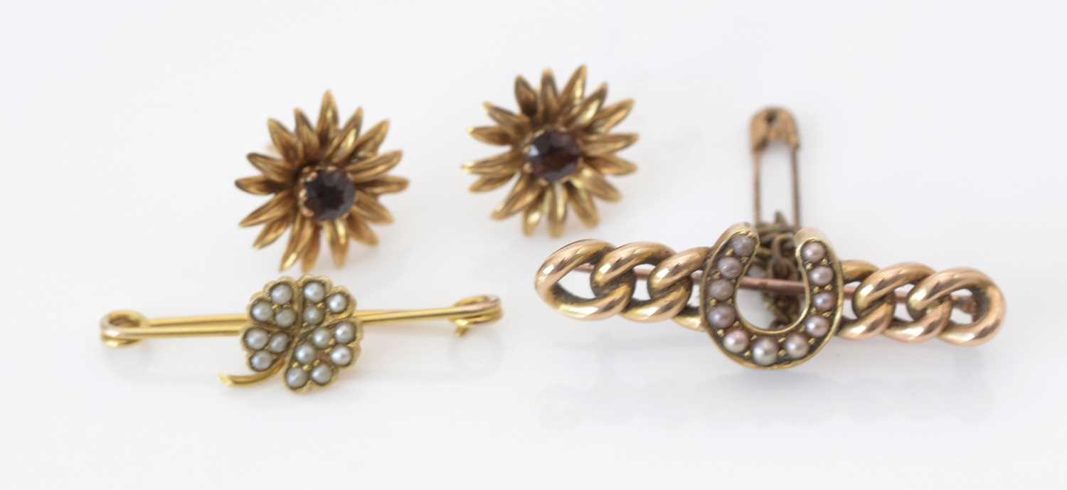 Lot 279 - Pair of earrings and two brooches.