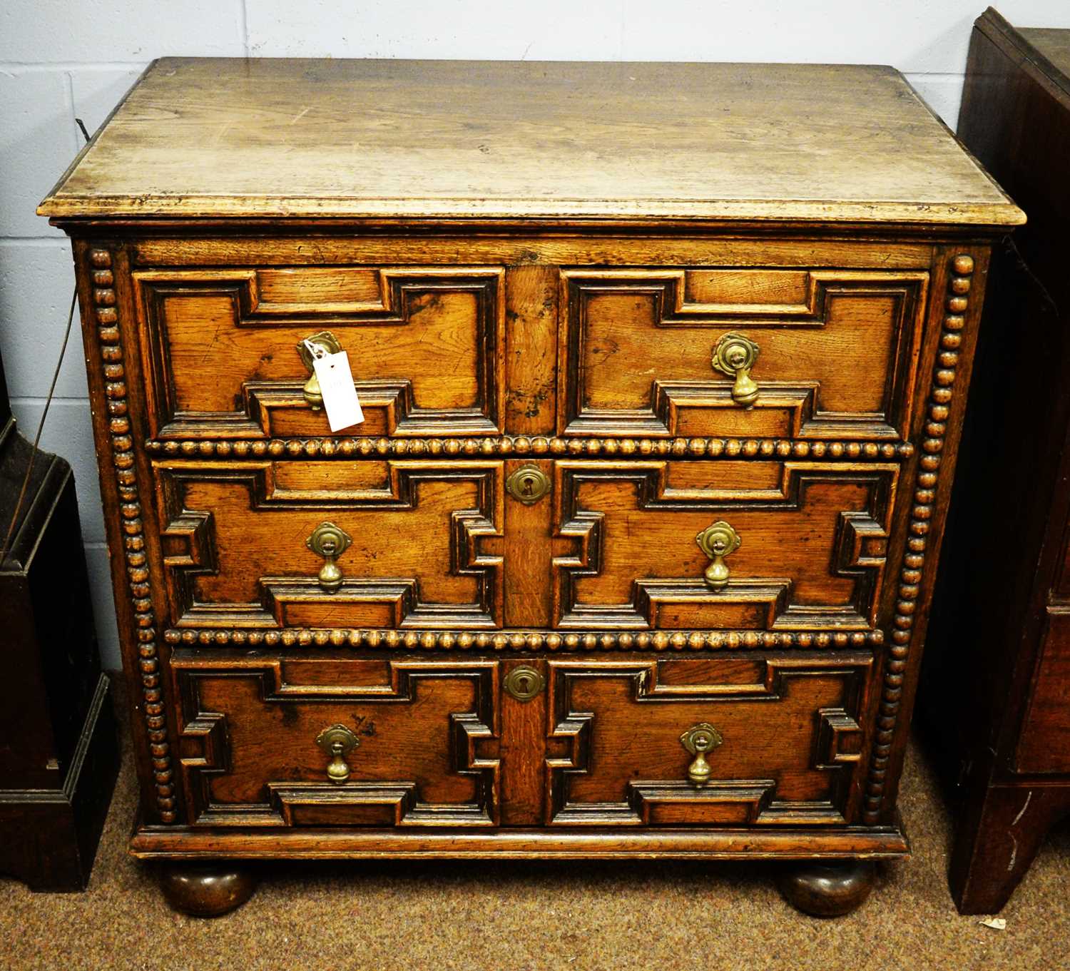 Lot 128 - 18th C geometric fronted chest of drawers.