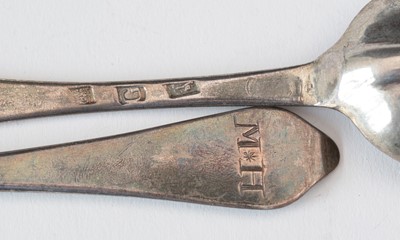 Lot 251 - Pair of George II silver spoons.