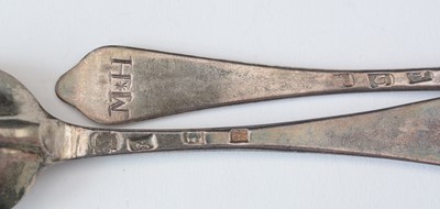 Lot 251 - Pair of George II silver spoons.