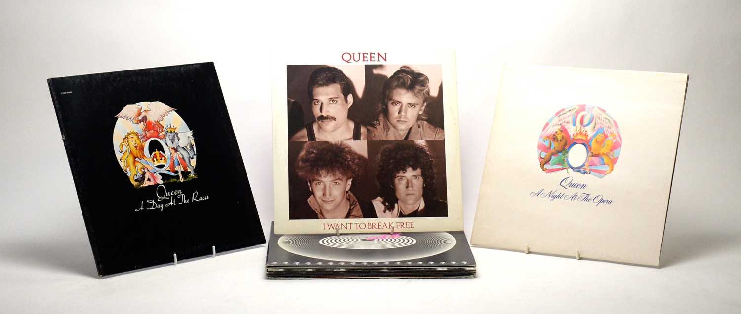 Lot 954 - Queen LPs and singles