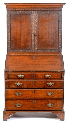 Lot 643 - George III oak provincial bureau bookcase