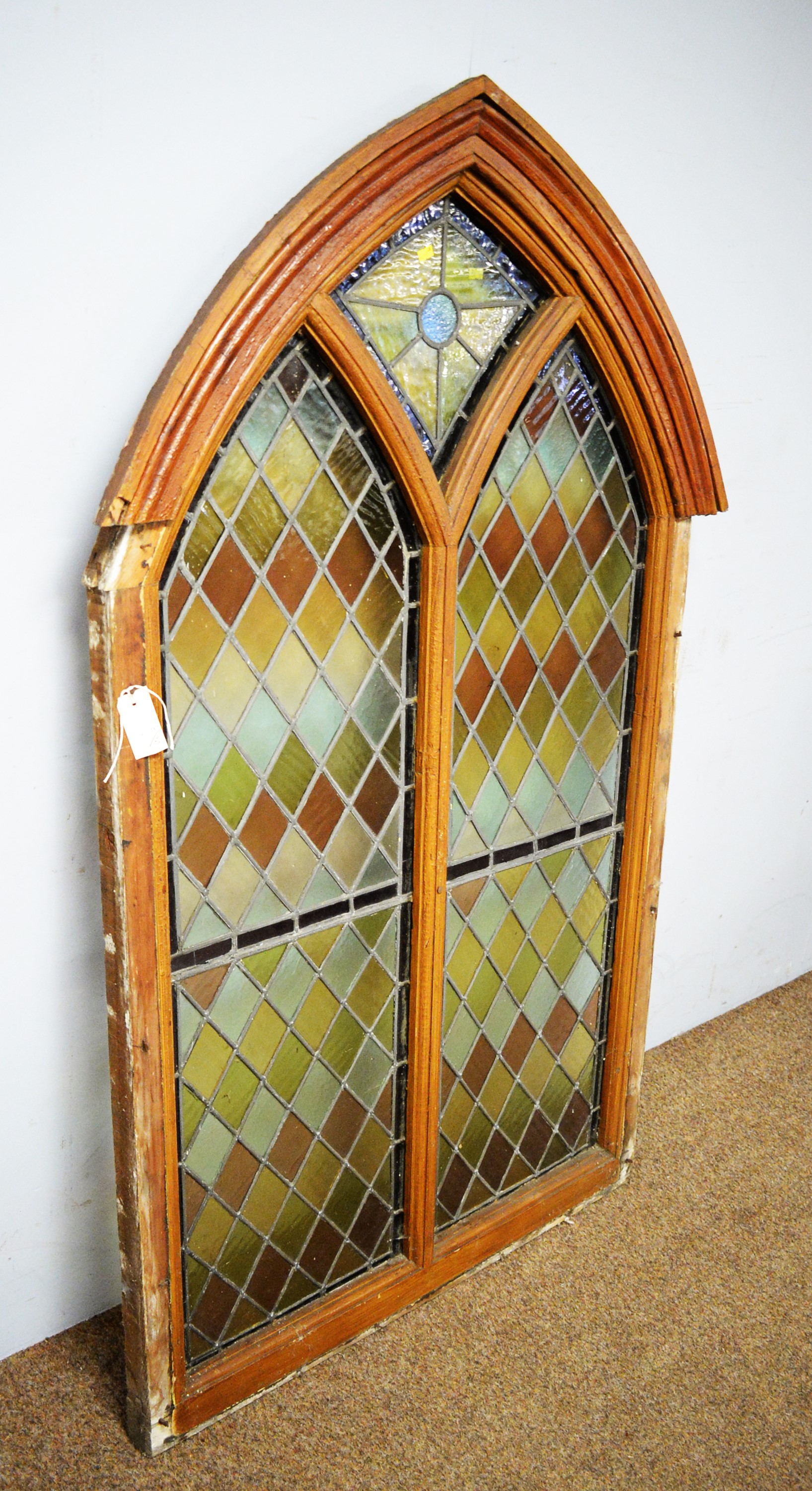 Lot 16 A Gothic style stained glass window