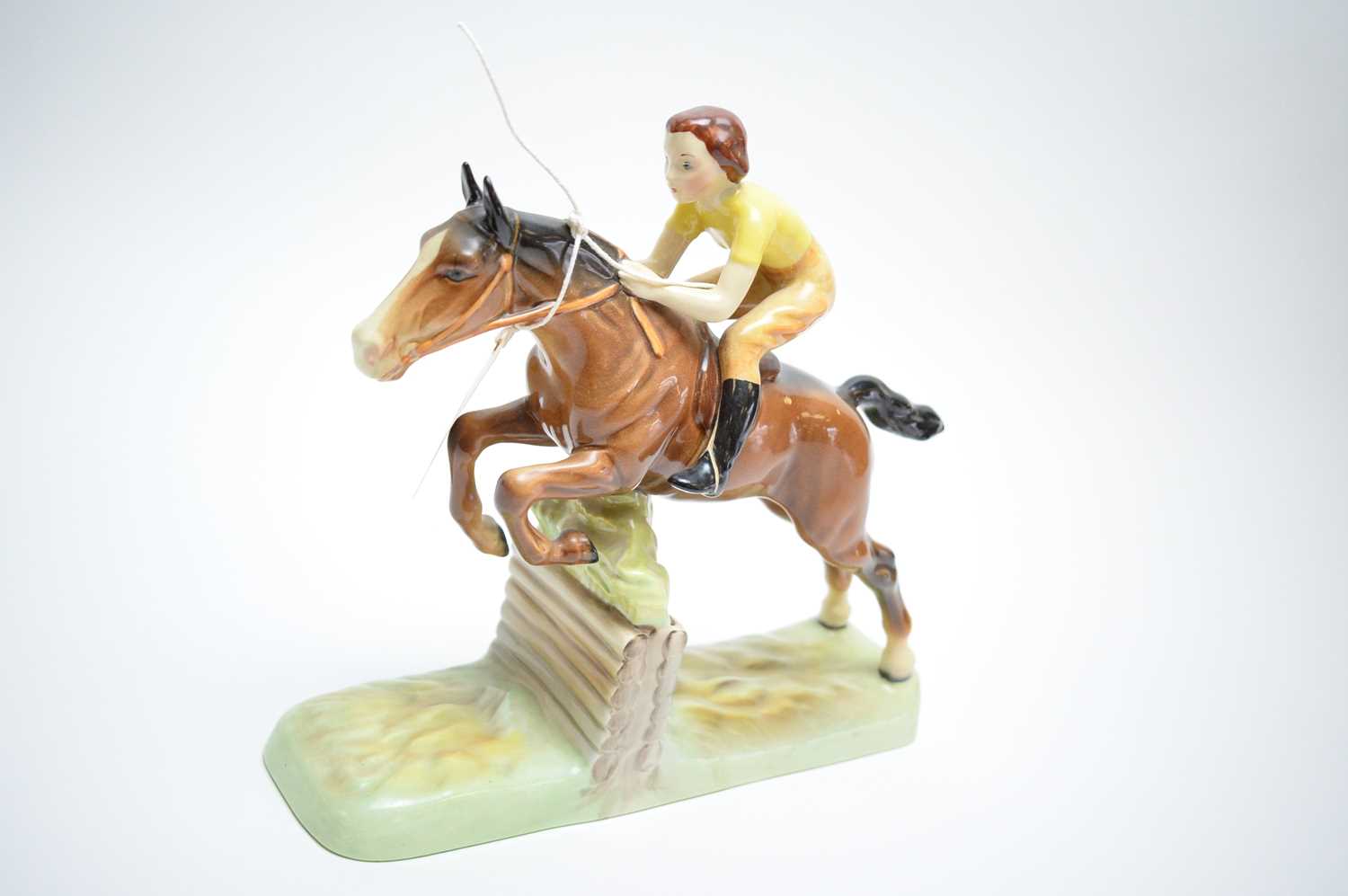 Lot 470 - Beswick model of a lady jockey.