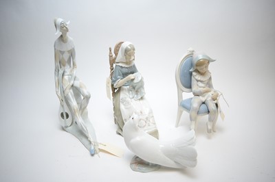 Lot 582 - Three Lladro figures and another.
