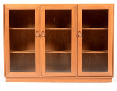 Lot 850 - Ercol: an elm Windsor bookcase/display cabinet.