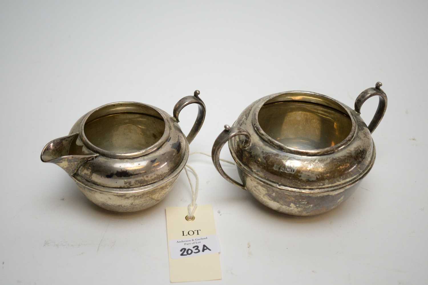 Lot 203 - George V silver jug and sugar.