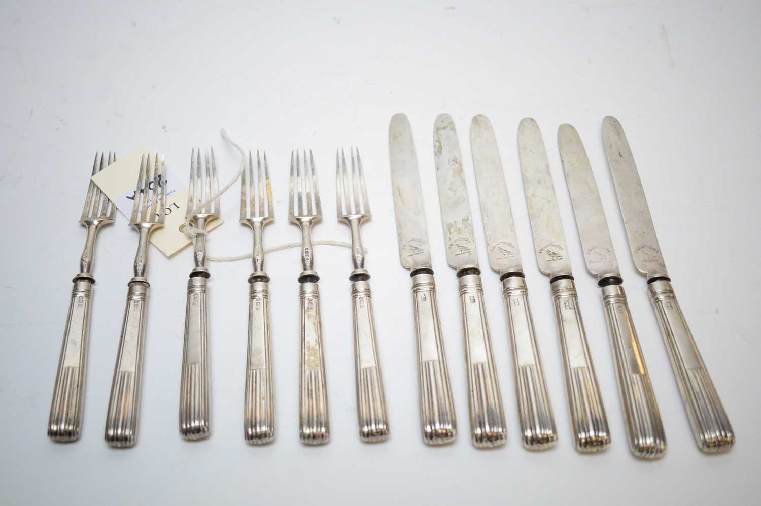 Lot 204 - Six Georgian silver knives and forks.