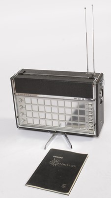 Lot 773 - A Philips FM-AM De Luxe portable World radio.