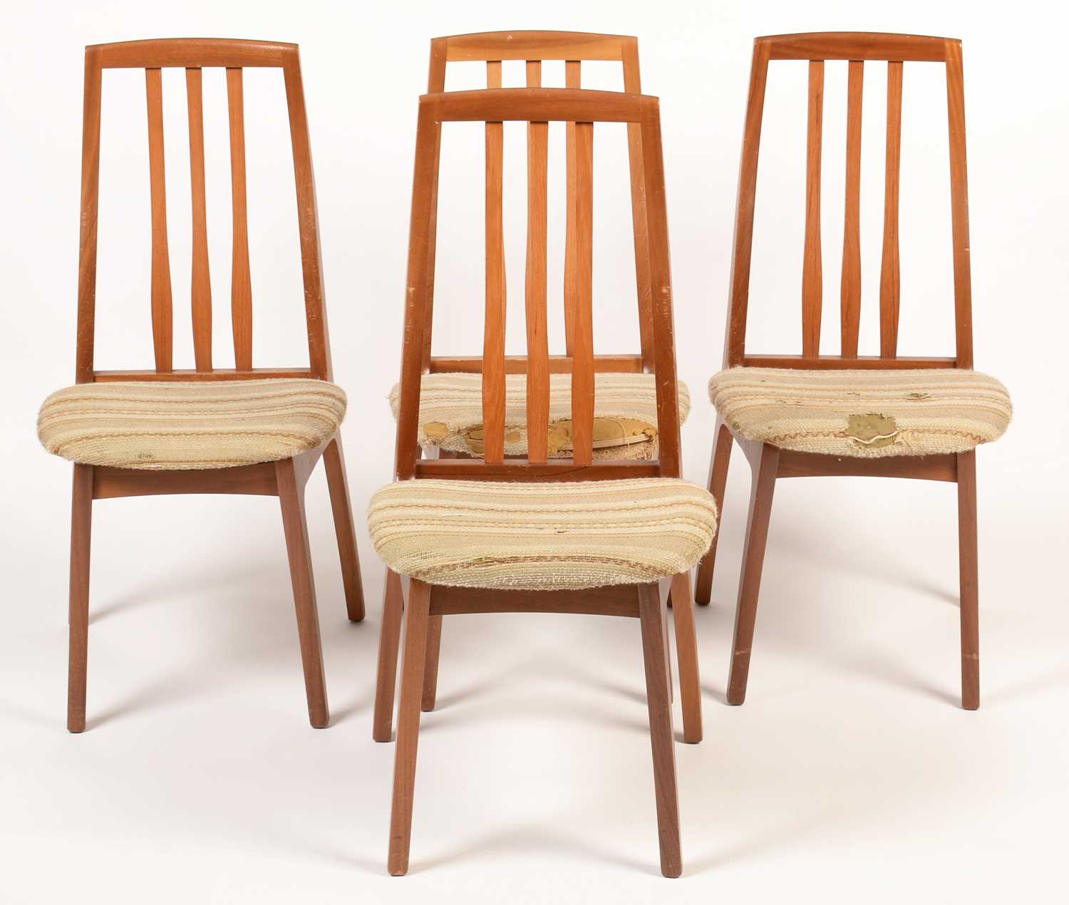 Lot 809 - A mid Century teak extending dining table in the G-Plan style; and four chairs.