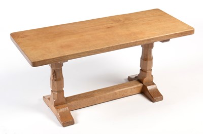 Lot 805 - Workshop of Robert 'Mouseman' Thompson: an oak coffee table.