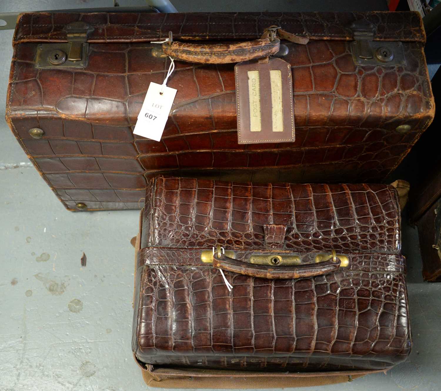 Lot 607 - Early 20th C crocodile skin travel trunk; and an alligator skin doctor's bag.