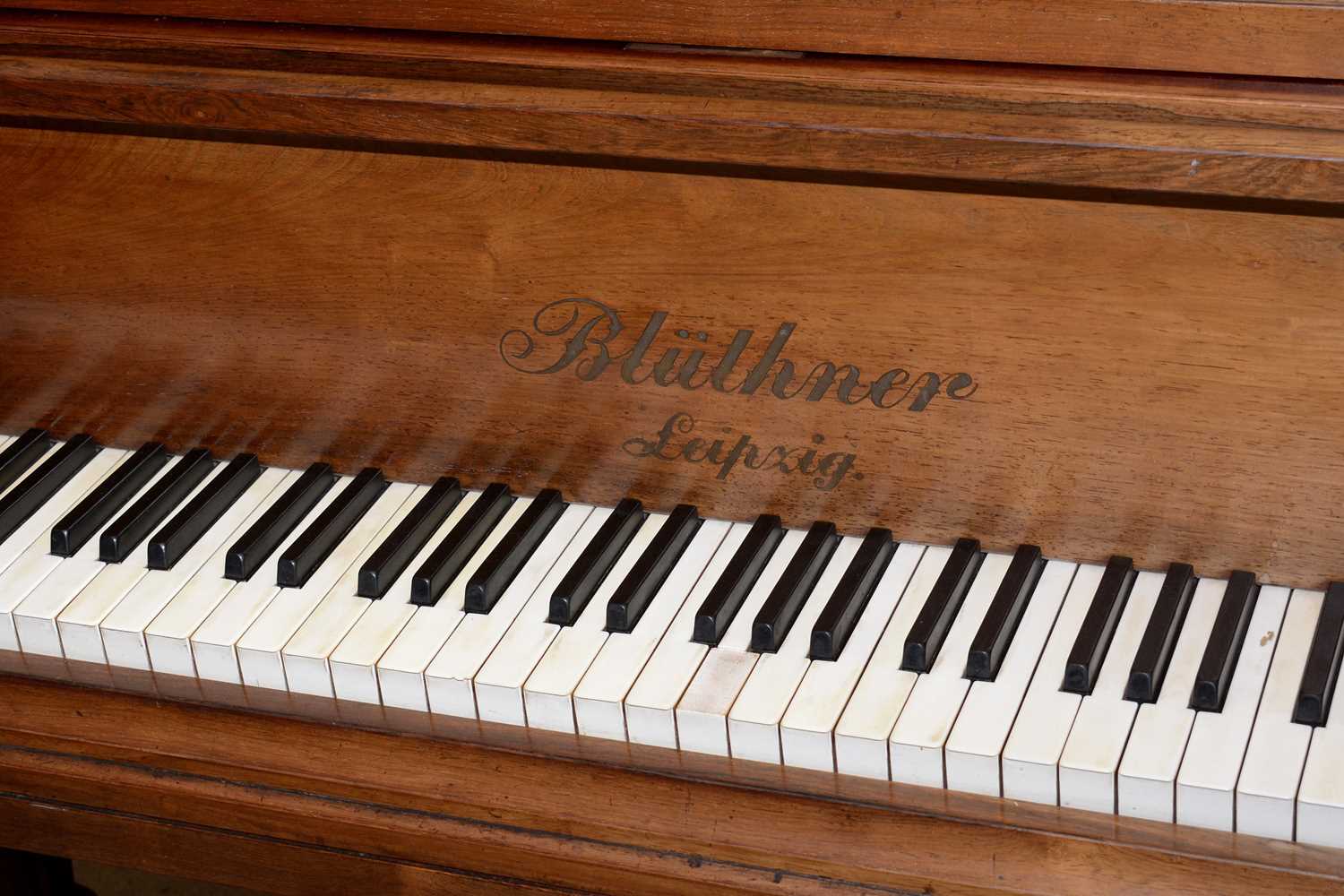 Lot 747 - A Bluthner Leipzig baby grand piano and