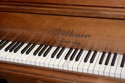 Lot 747 - A Bluthner Leipzig baby grand piano and piano stool.