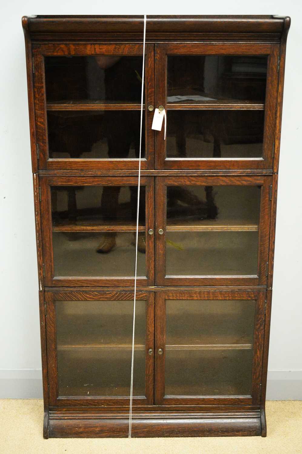 Lot 122 - An early 20th Century oak Globe Wernicke style stacking bookcase