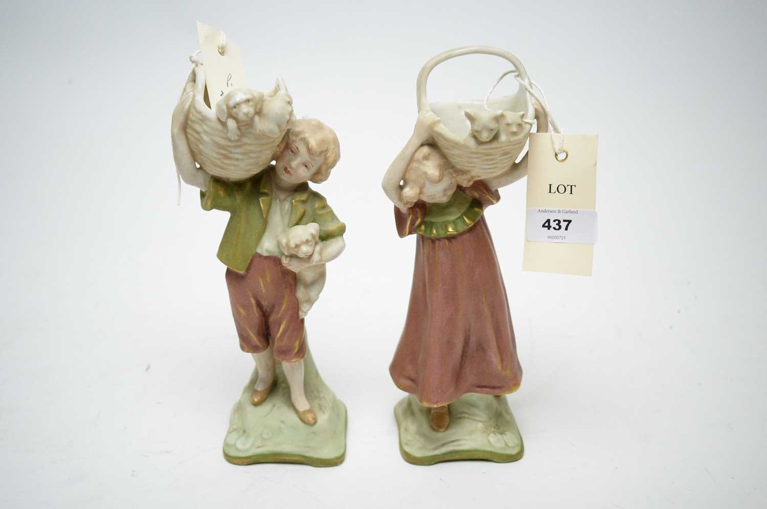 Lot 437 - A pair of Royal Dux figures