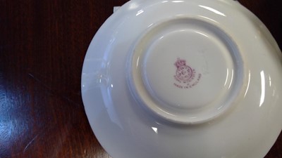 Lot 446 - A Royal Worcester hand-painted cup and saucer