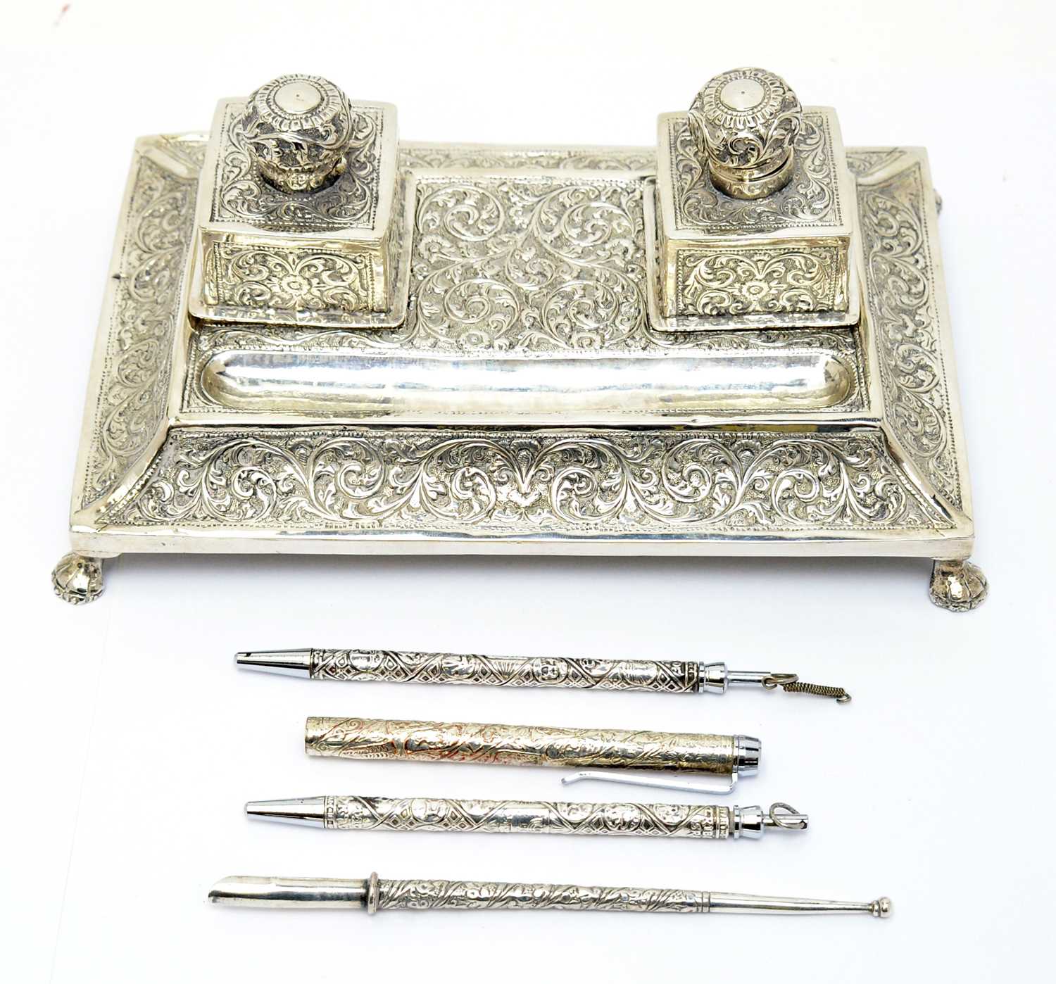 Lot 209 - A white metal Indo-Persian pen and ink stand