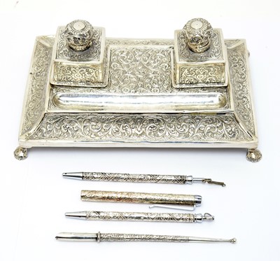 Lot 209 - A white metal Indo-Persian pen and ink stand