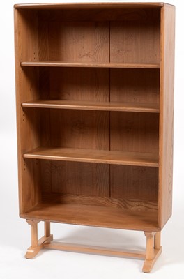 Lot 867 - Ercol: a beech and elm open bookcase.