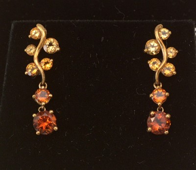 Lot 247 - A pair of citrine drop earrings.