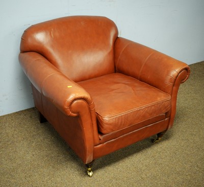Lot 66 - Tanned leather upholstered open armchair.