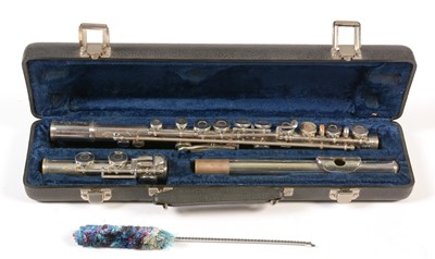 Lot 868 - Sapphire branded flute; and a child's guitar.