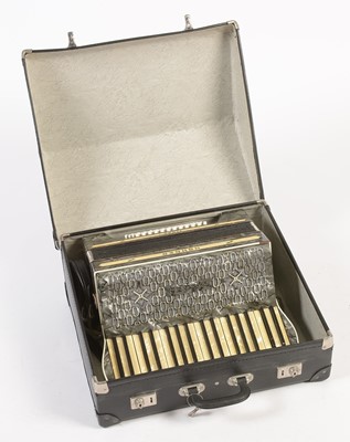 Lot 707 - A Hohner Tango 48 bass piano accordion.