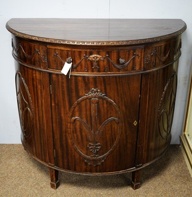 Lot 83 - A Maple & Co. demi lune mahogany side cabinet