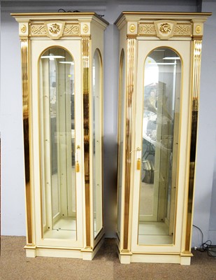 Lot 82 - A pair of Italian cream painted display cabinets