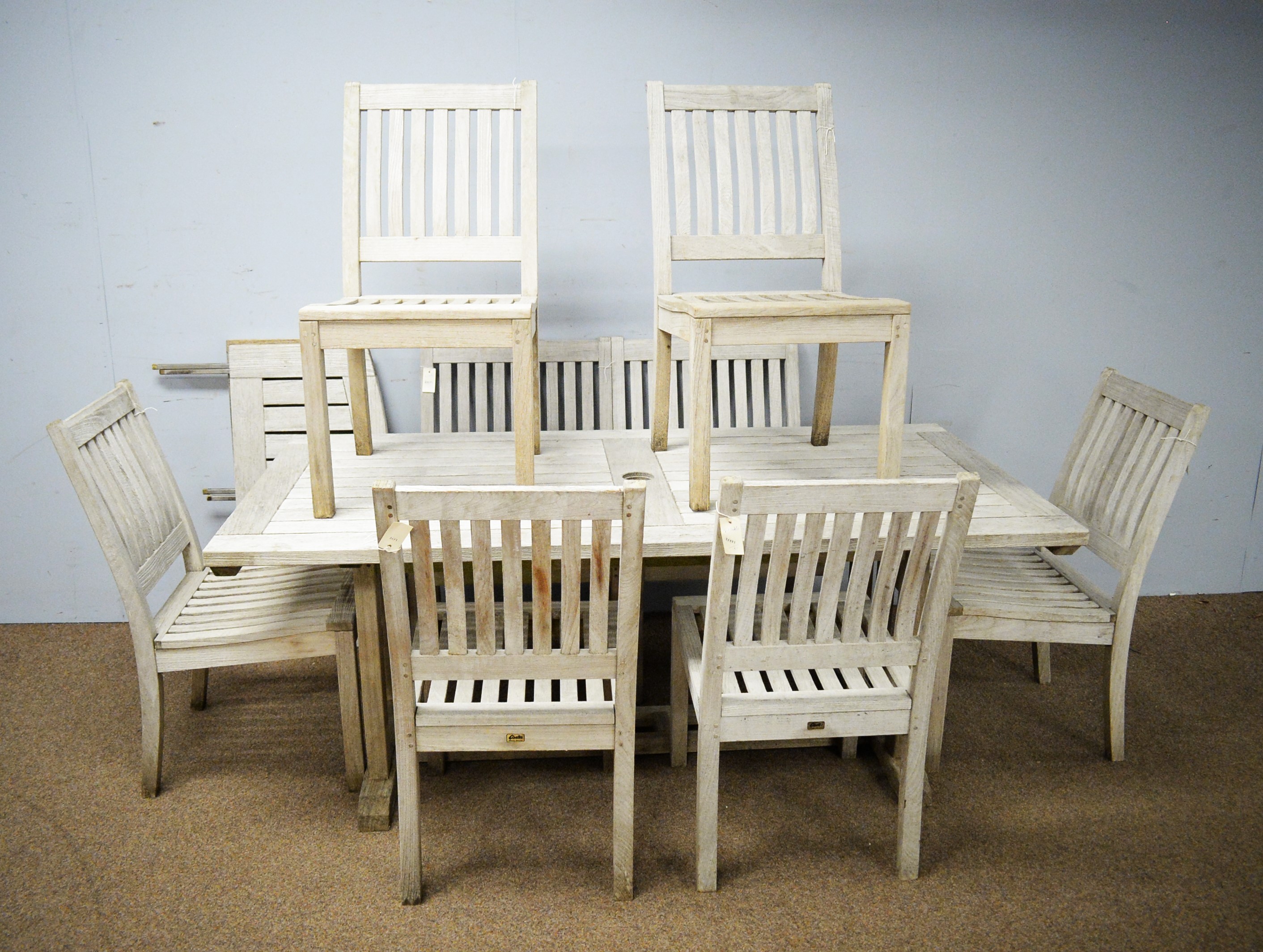 Lot 63 A Gloster teak garden dining room set