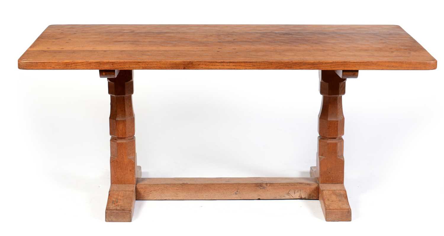 Lot 653 - Mid 20th Century Robert 'Mouseman' Thompson oak dining table
