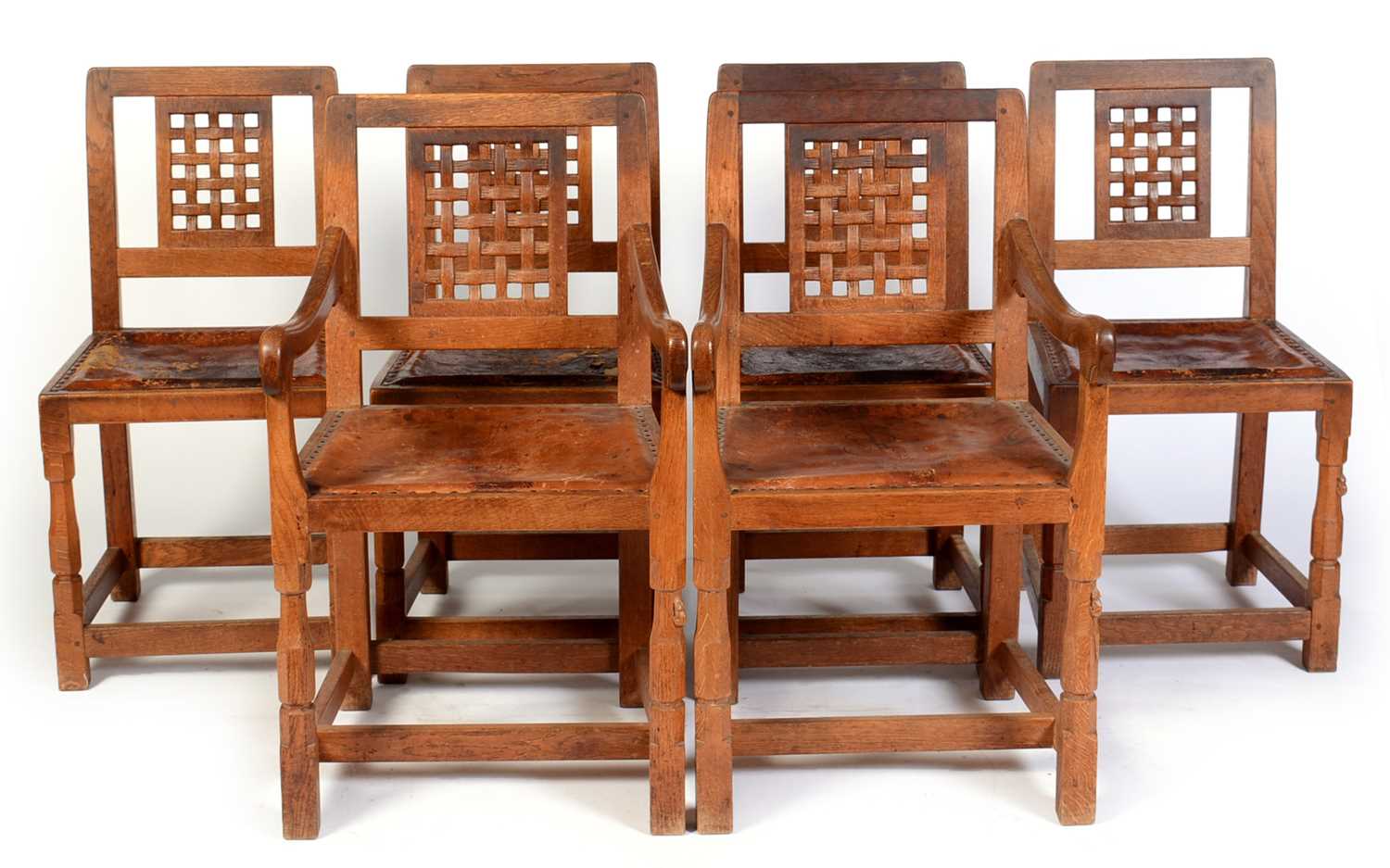 654 - Set of six mid 20th Century Robert 'Mouseman' Thompson oak dining chairs 