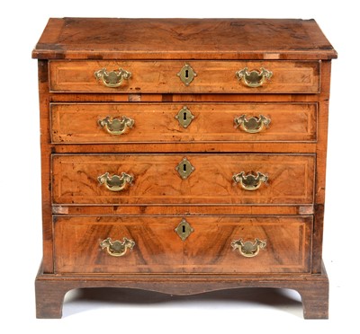 Lot 656 - George III walnut chest of drawers