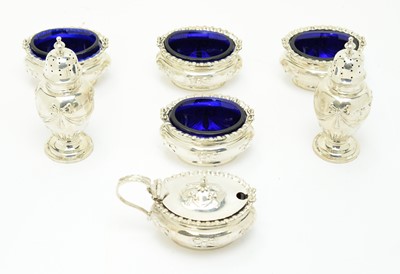 Lot 155 - An Edwardian cased silver cruet set
