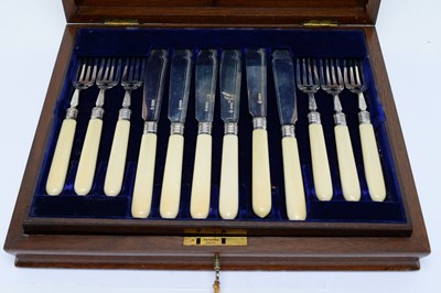 Lot 156 - A Victorian canteen of twelve silver and ivory handled fish knives and forks