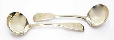 Lot 160 - A pair of George III silver sauce ladles