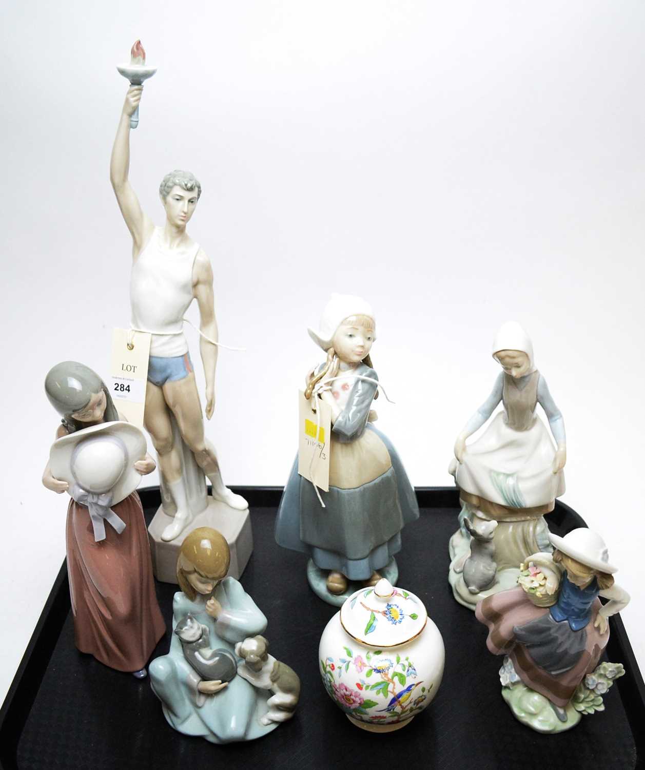 Lot 284 - A collection of six Lladro figurines and an Aynsley jar.