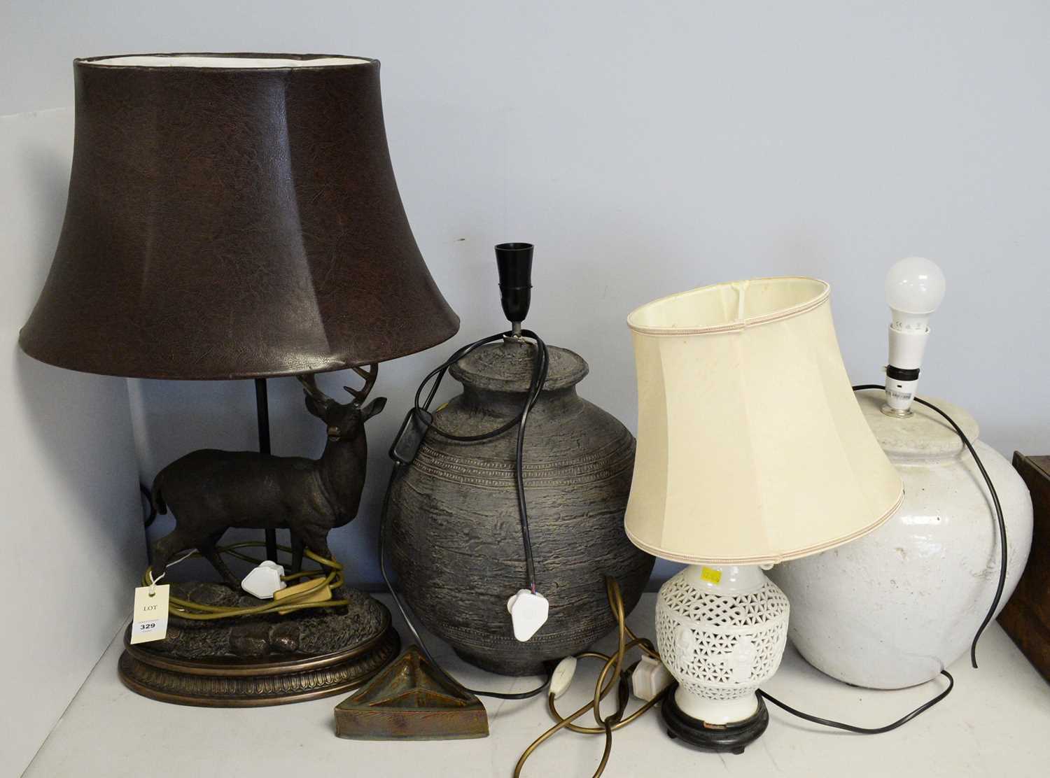 Lot 328 - Figural table lamp; and three other table lamps, various.