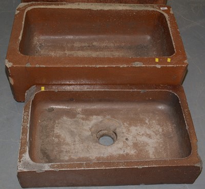 Lot 497 - A sink shaped planter and a similar smaller planter.