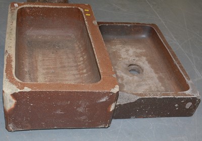Lot 497 - A sink shaped planter and a similar smaller planter.