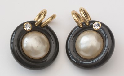 Lot 753 - Chanel: a pair of faux mabe-pearl, black plastic and gilt metal earrings