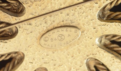 Lot 755 - Chanel: gilt metal sun brooch