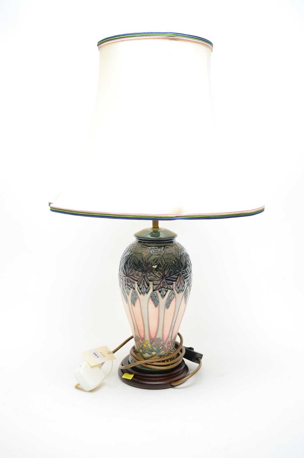 Lot 301 - A Moorcroft table lamp.