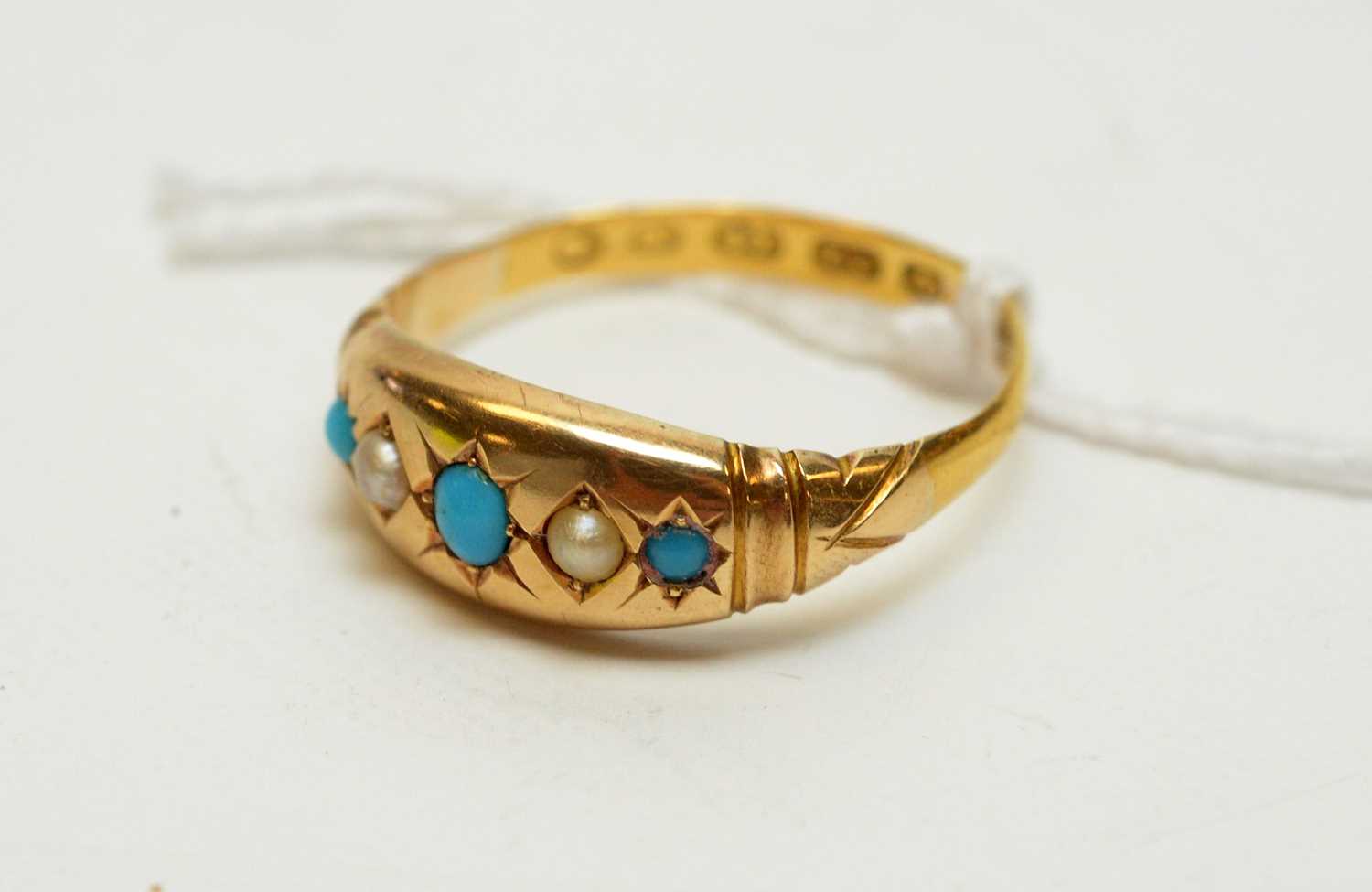 Lot 236 - Turquoise and seed pearl ring