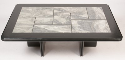 Lot 869 - An ebonised and tiled coffee table.