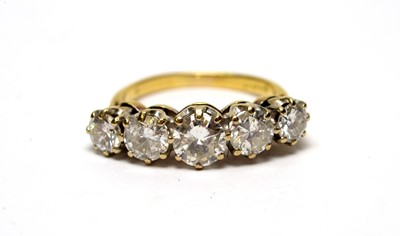 Lot 5 - A five stone diamond ring