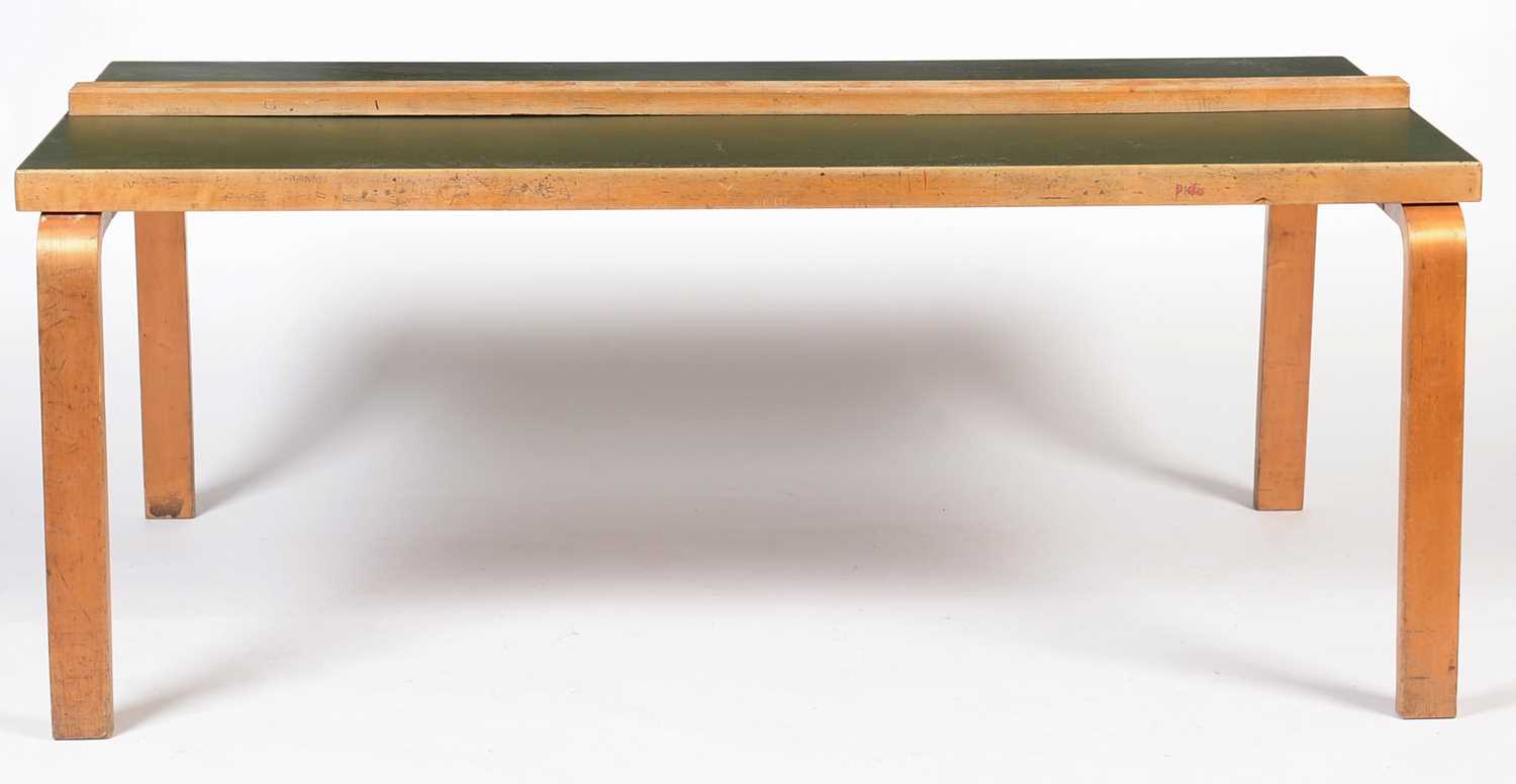 Lot 75 - Alvar Aalto for Finmar Ltd, a birch and plywood dining table