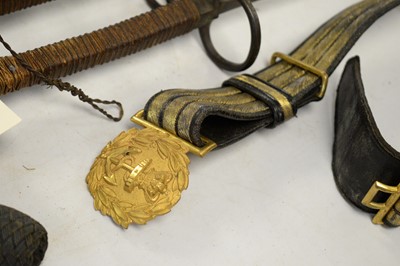 Lot 397 - A collection of militaria including swords.