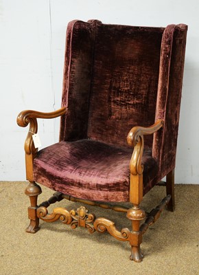 Lot 55 - Early 20th C walnut wing back armchair.